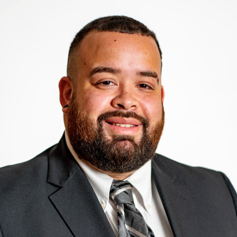 A headshot of Luis Figueroa.