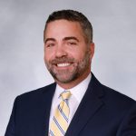 A headshot of Daniel Sousa.