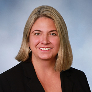 A headshot of Erin Riley.