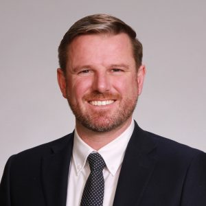 A headshot of Geoff Leahy.