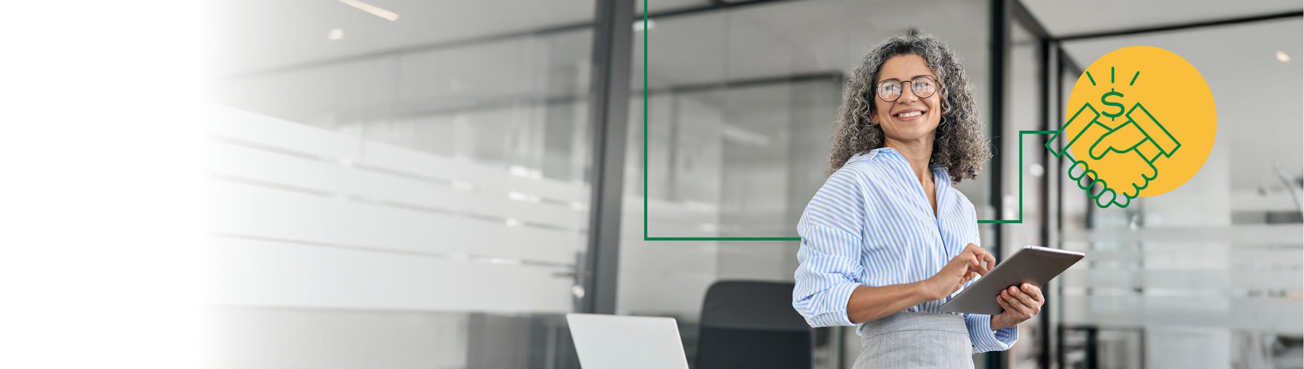 A woman holding an iPad and smiling