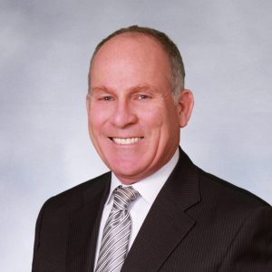 A headshot of Michael Wheeler.