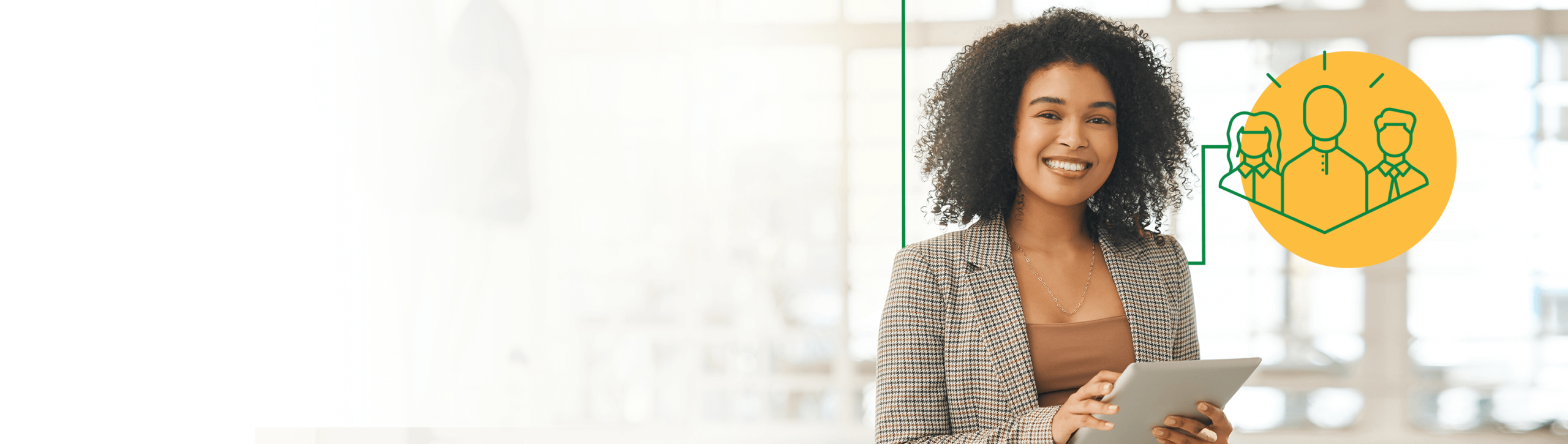 Smiling business woman holding a tablet