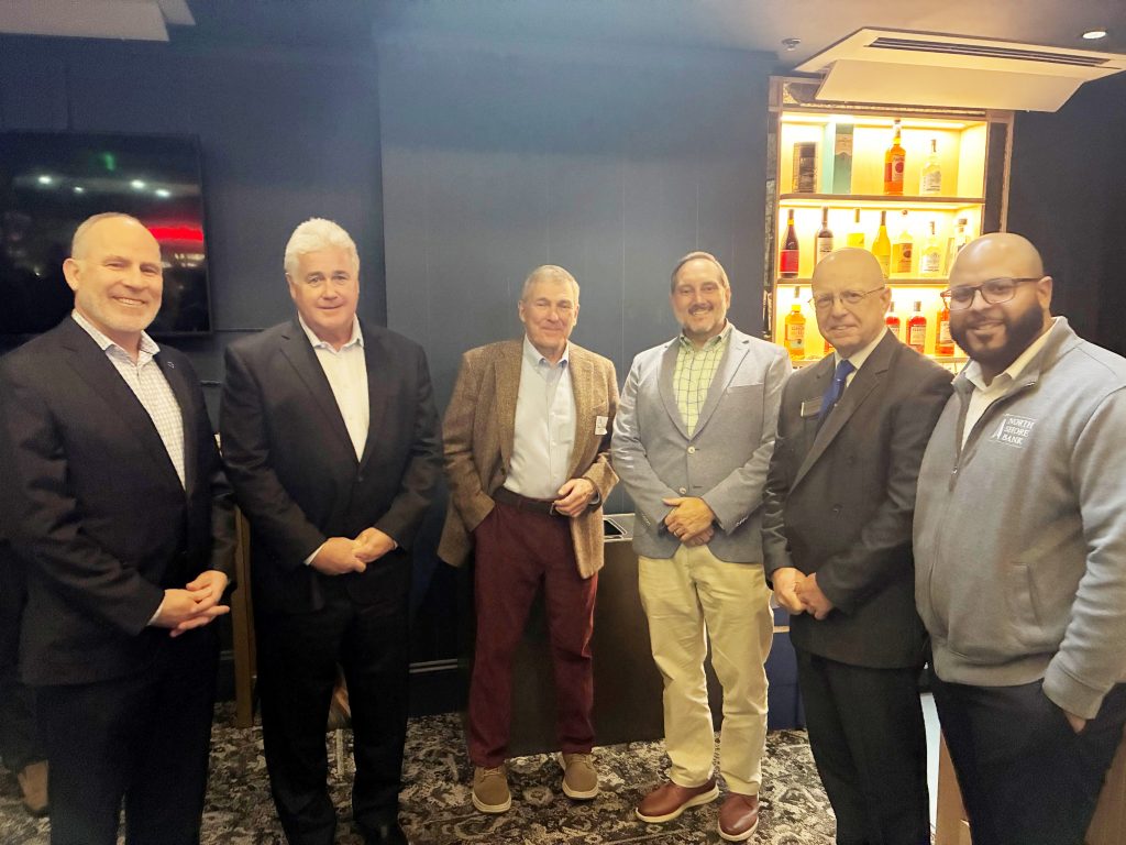 A group at the ribbon cutting ceremony for Stageside Lounge at The Cabot. 