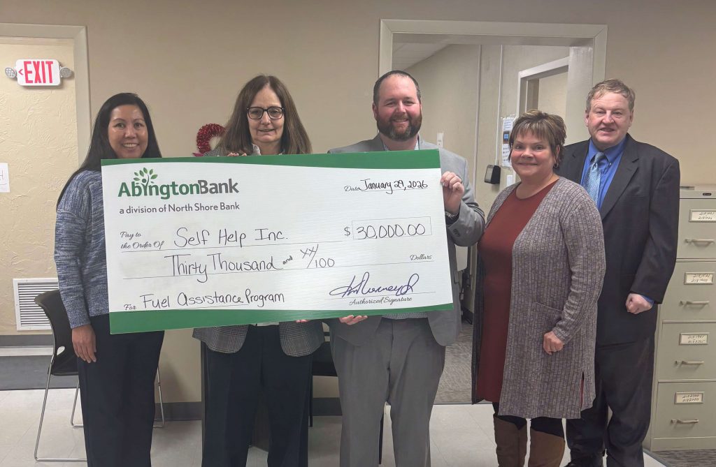 A check donation to Self Help Inc Fuel Assistance Program through our charitable giving program, The Giving Tree.