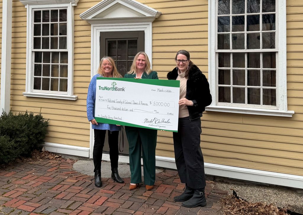 A check donation to Quincy Homestead from our charitable giving program, The Giving Tree. 