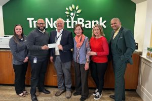A check donation to Beverly Education Foundation from from our charitable giving program, The Giving Tree.