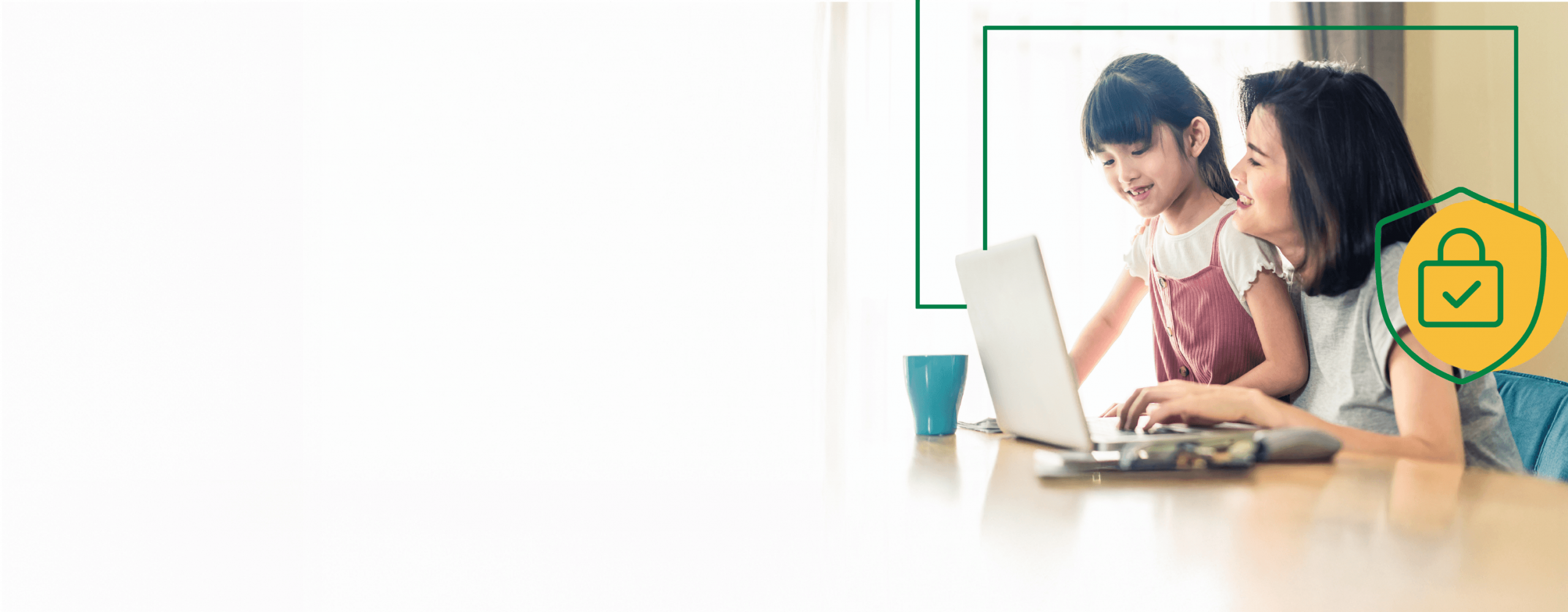 A woman and her daughter using their laptop at the dining room table. There's a green line that links to a shield icon in the background.