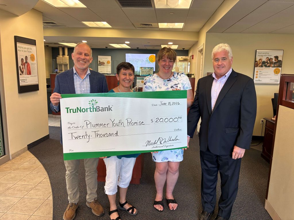 A check donation from TruNorth Bank $20,000 to Plummer Youth Promise Capital Campaign.
