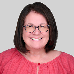 A headshot of Kerry Shaw.