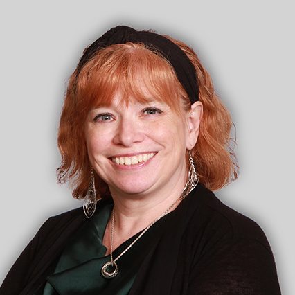 A headshot of Tracey Coney.
