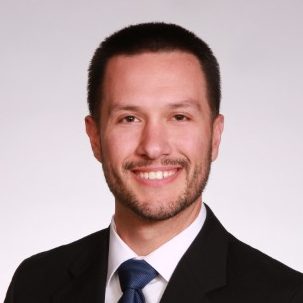 Headshot of Curtis Szcsechowicz.