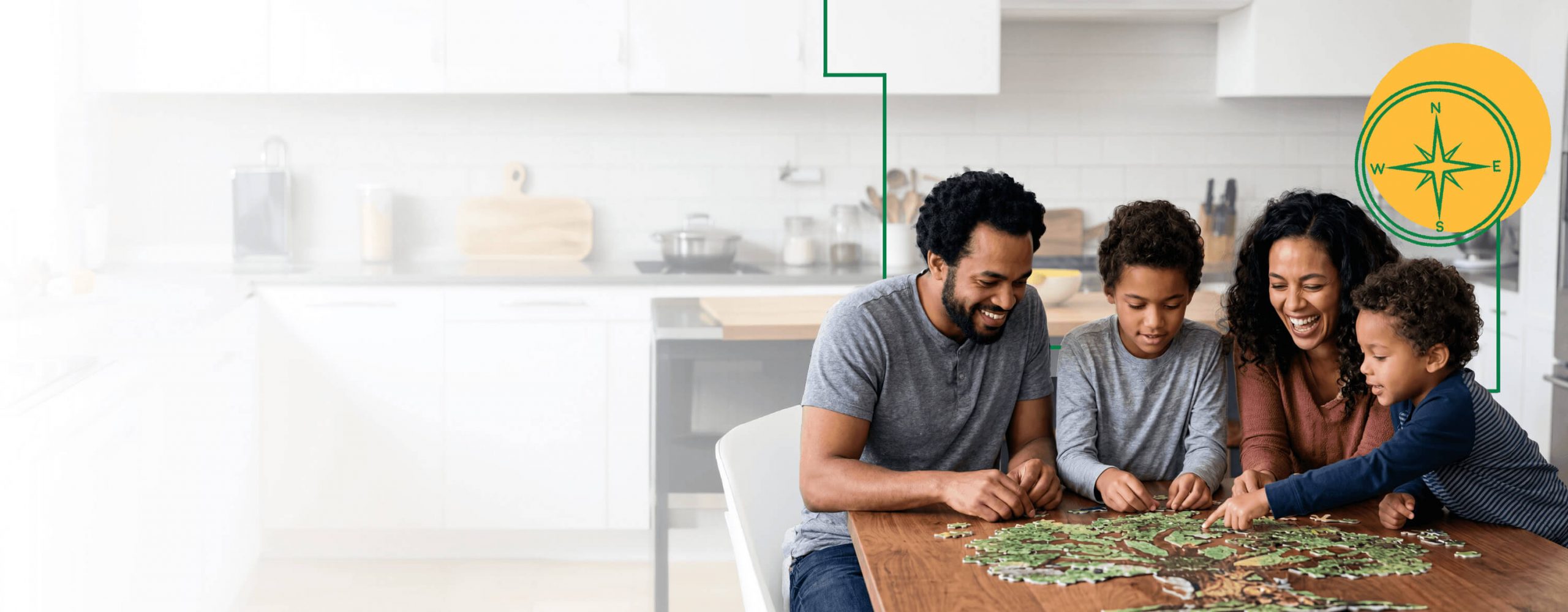 A family sitting around a table in the kitchen putting together a puzzle of tree.